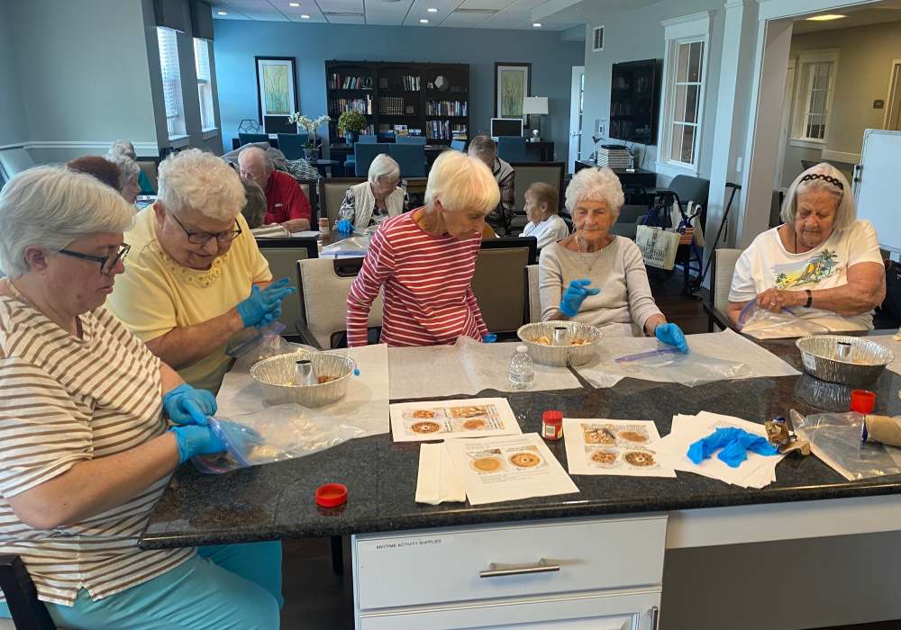 Residents doing arts and crafts at Merrill Gardens at West Chester in West Chester, Pennsylvania