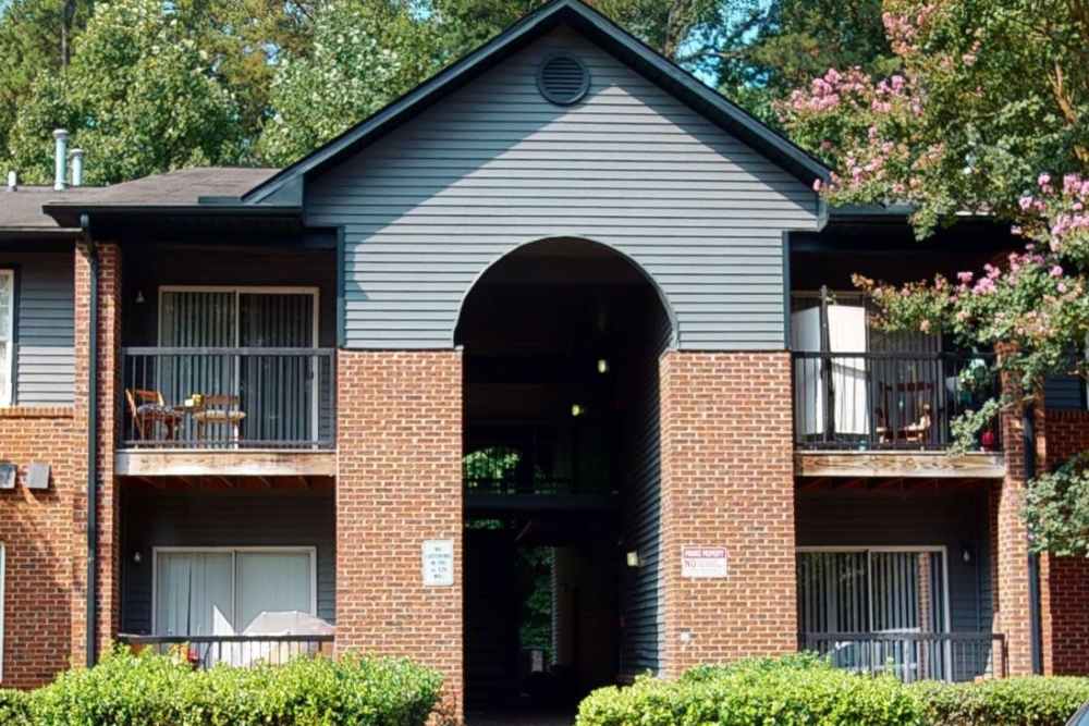 Community building exterior view with patio  at Wallace Terrace Apartments in Charlotte, North Carolina