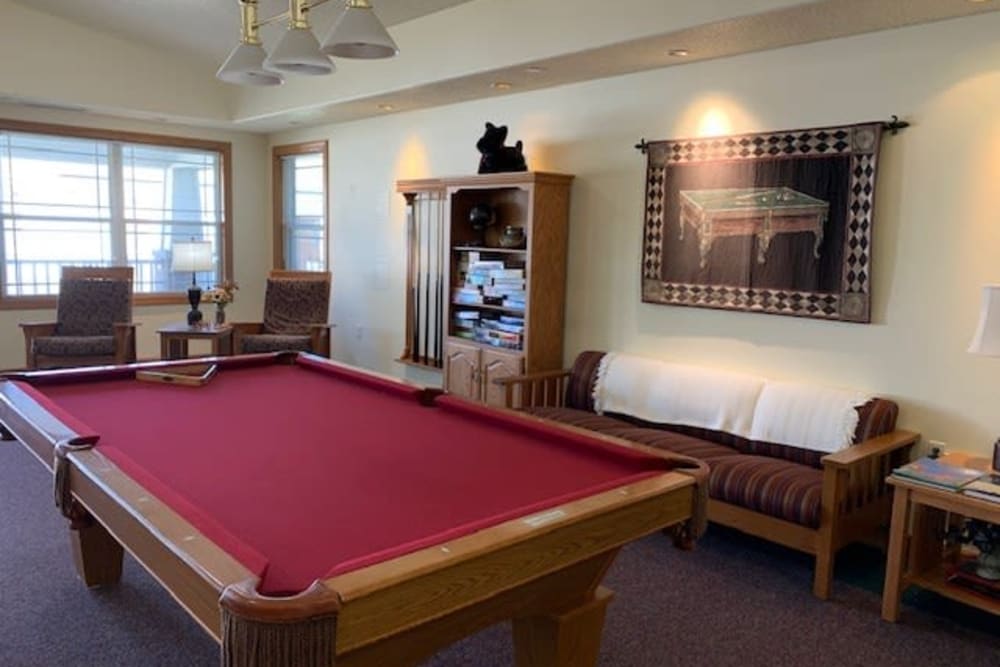 Activity room includes a pool table at Prairie Hills in Clinton, Iowa.