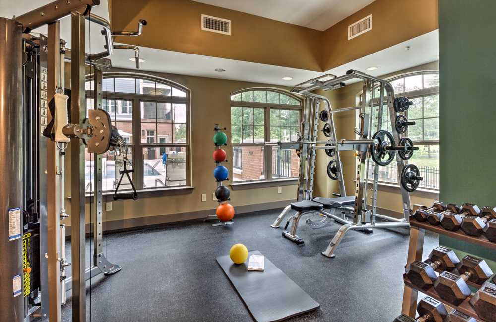 Gym equipment in fitness center at Cedar Flats in Charlotte, North Carolina