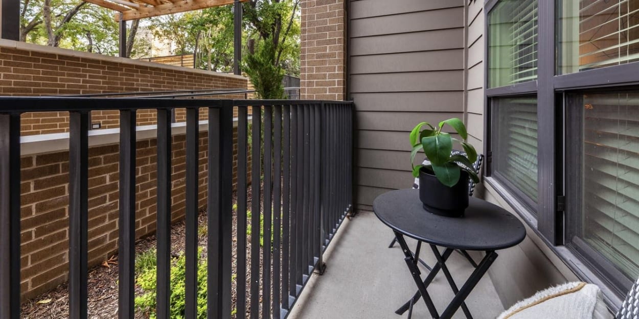 Furniture on a private patio at Ross + Peak in Dallas, Texas