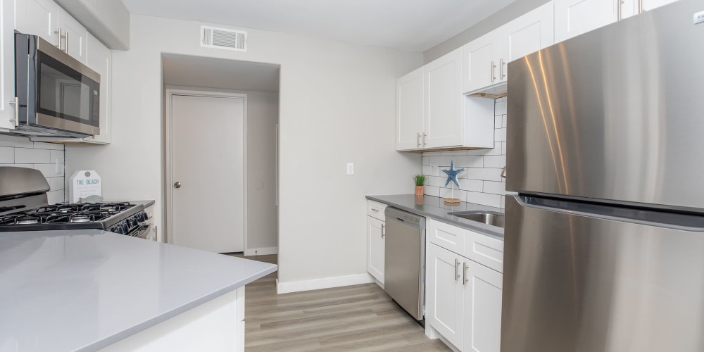 Kitchen with stainless-steel appliances at Tides at North Nellis in Las Vegas, Nevada