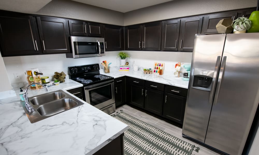 Kitchen at Portico at Friars Creek Apartments in Temple, Texas