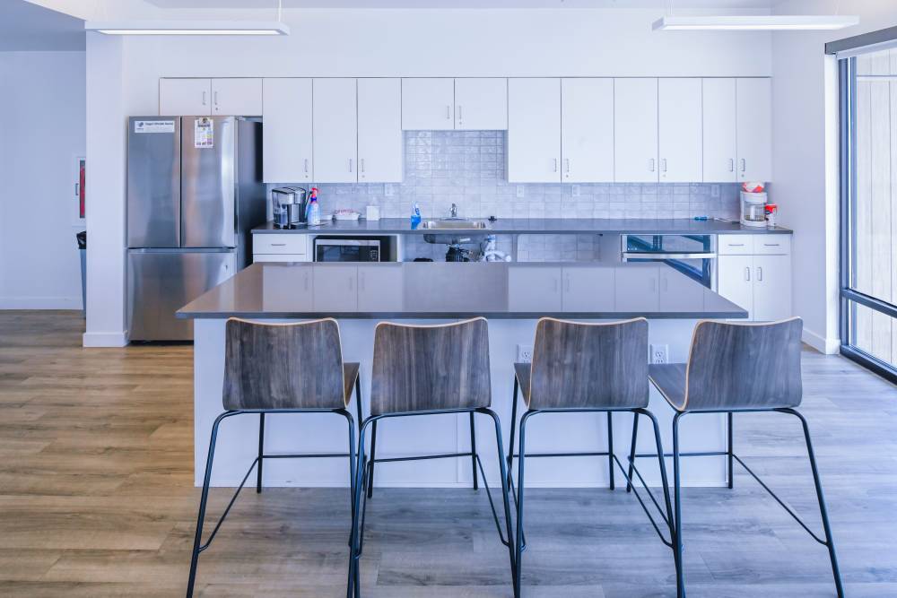 Island kitchen inside the clubhouse at The Rose on Colfax in Denver,Colorado