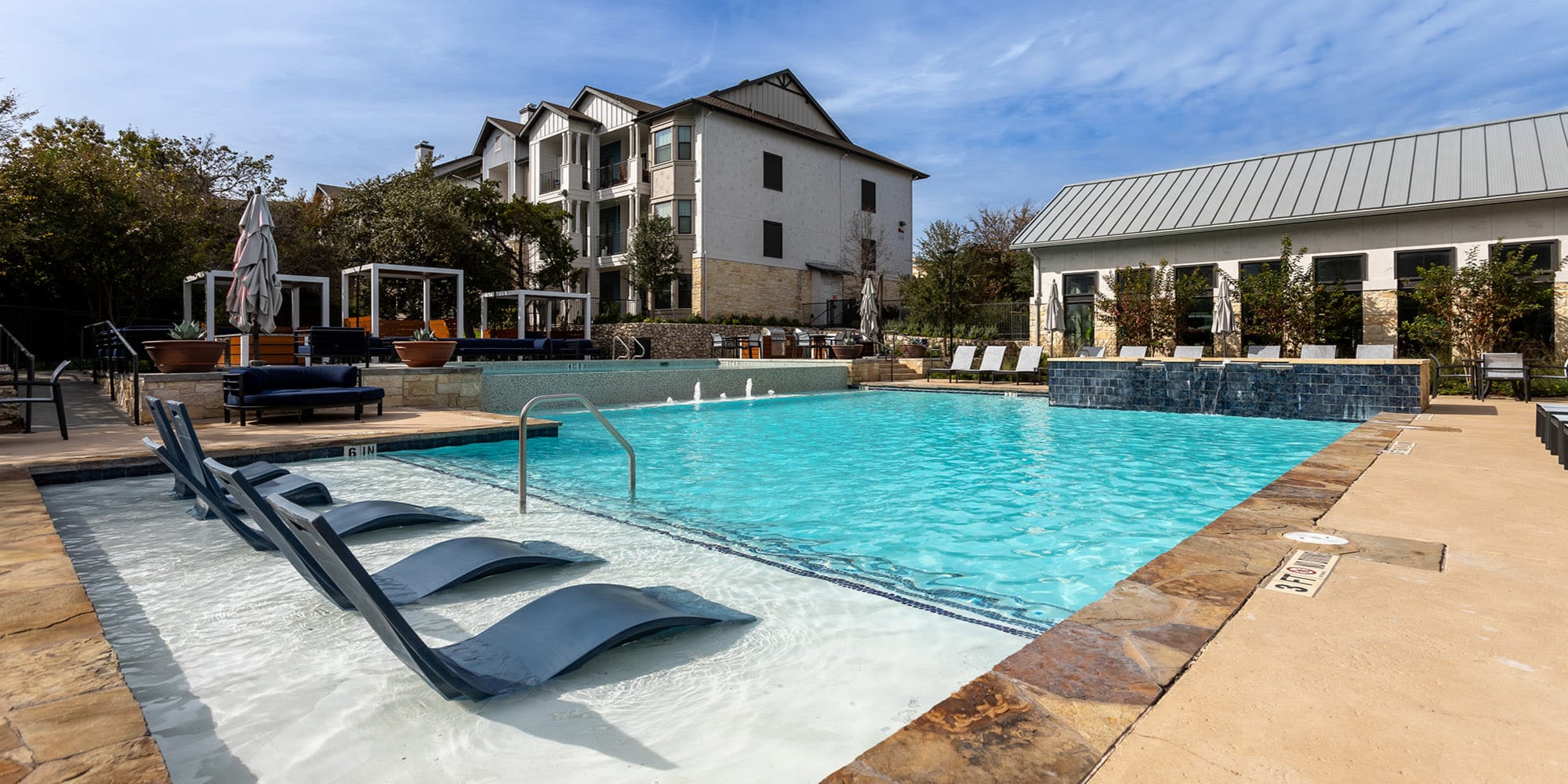 Apartment view from Pool area at Estates at Bee Cave in Bee Cave, Texas