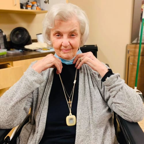 Resident with a fresh haircut in the sallon at The Oxford Grand Assisted Living & Memory Care in McKinney, Texas