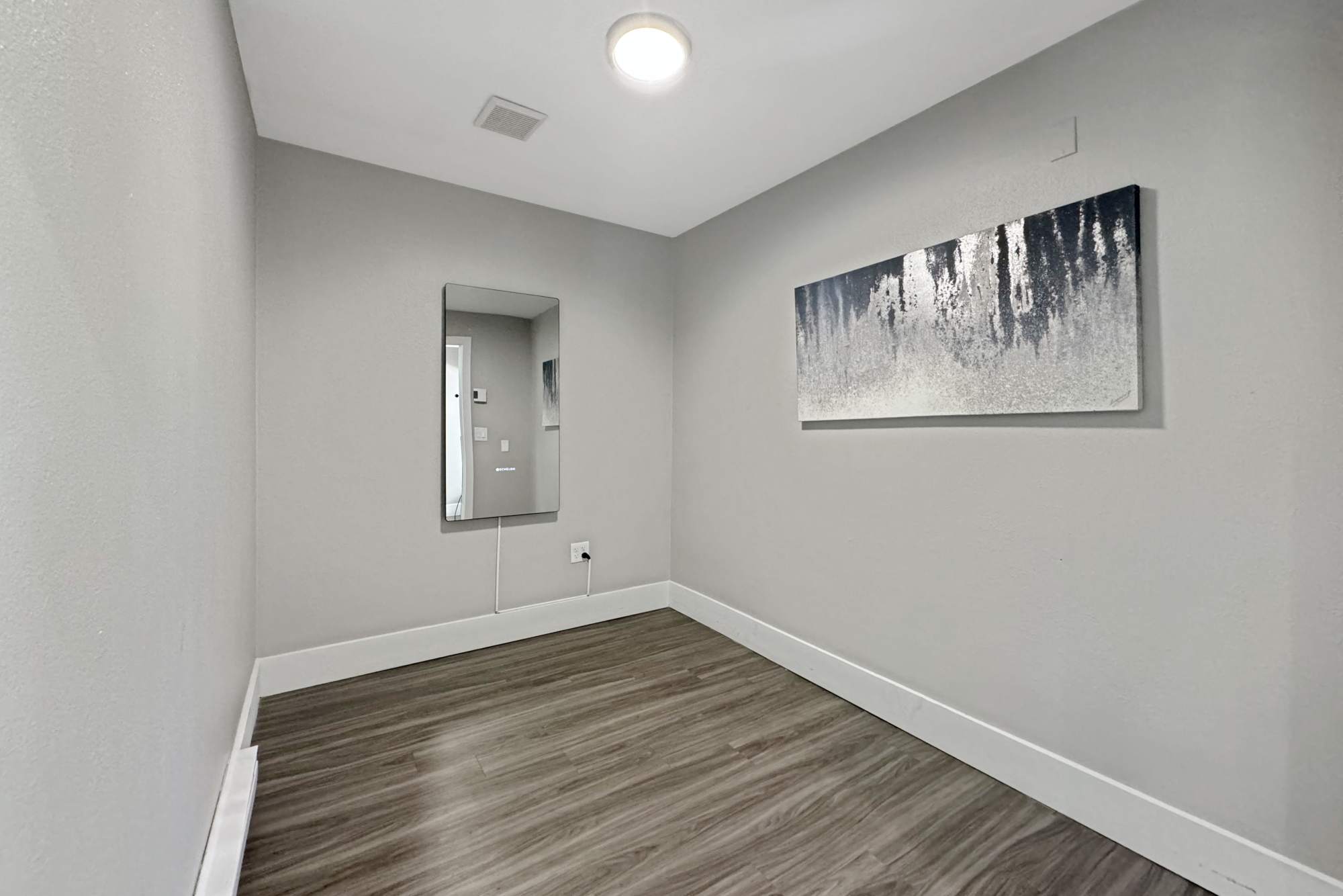 Fitness center Mirror Room at Newport Crossing Apartments in Newcastle, Washington
