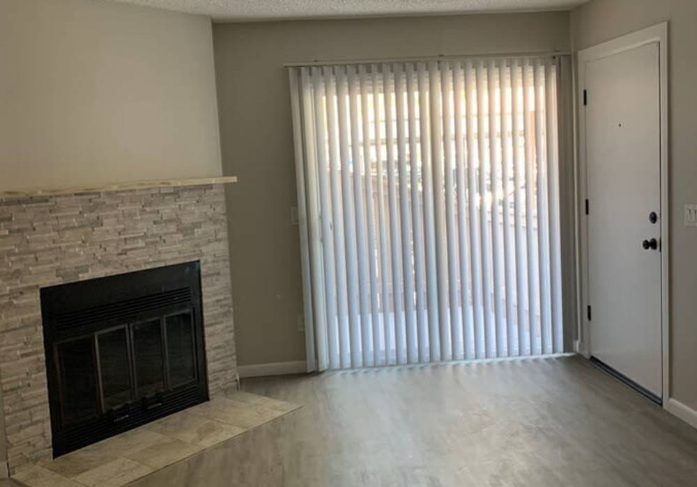 Living room with fireplace at Oak Hill in Escondido, California