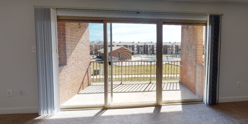 Glass doors to patio at Rolling Park Apartments in Windsor Mill, Maryland