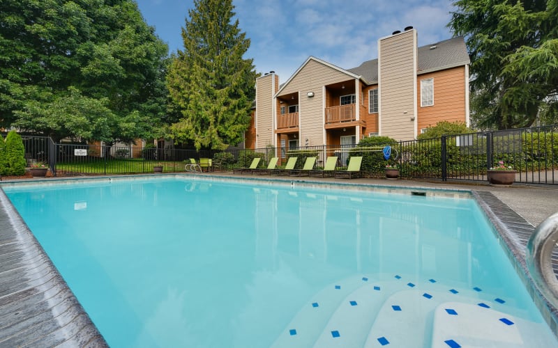 The large blue pool at Carriage House Apartments in Vancouver, Washington