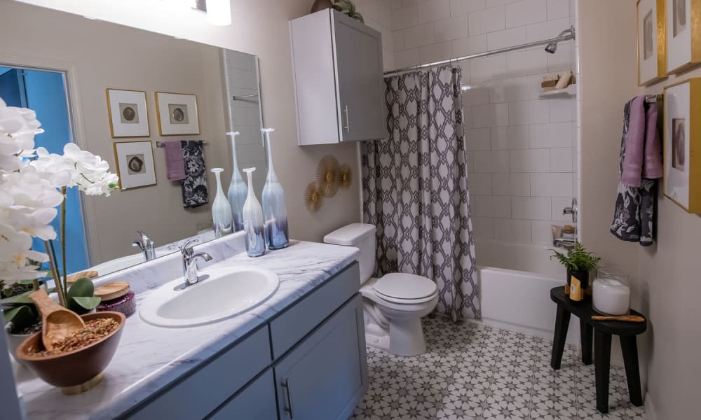 Spacious bathroom with tile flooring at Redbud Ranch Apartments in Broken Arrow, Oklahoma