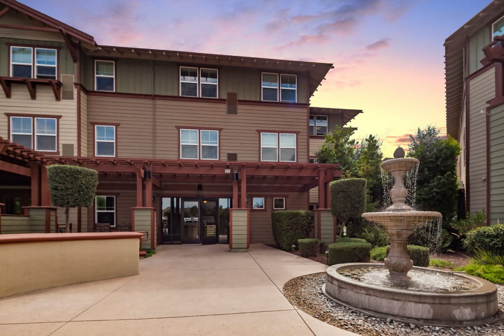 Courtyard with water fountain at our senior living community in Gilroy, CA