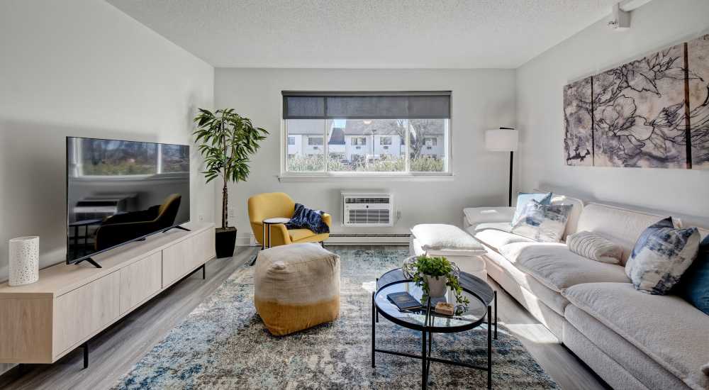Well-lit modern living area at The Otis in Dallas, Texas
