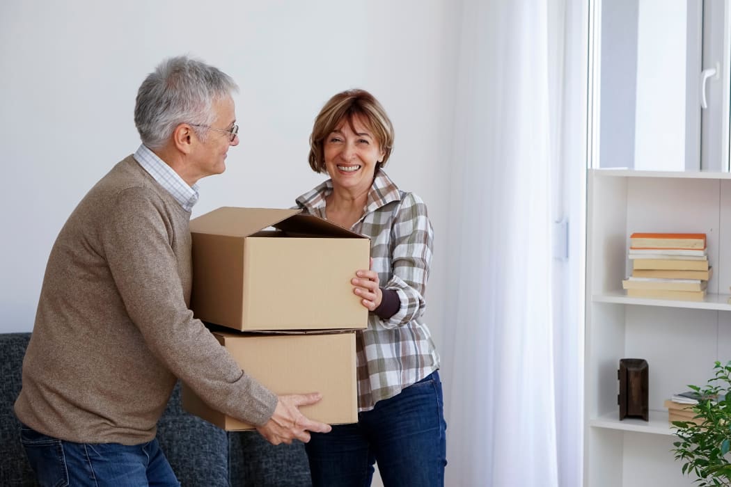 Couple moving some boxes to be stored at Lockaway Storage in San Antonio, Texas