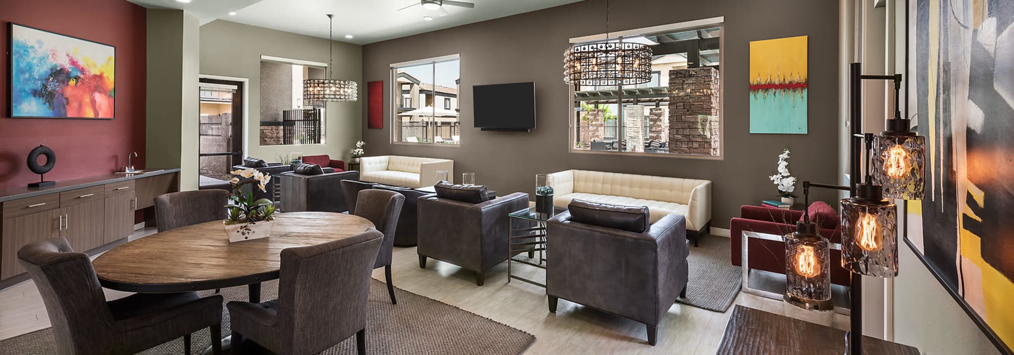 Apartment clubhouse with lounge at The Maxx 159 in Goodyear, Arizona