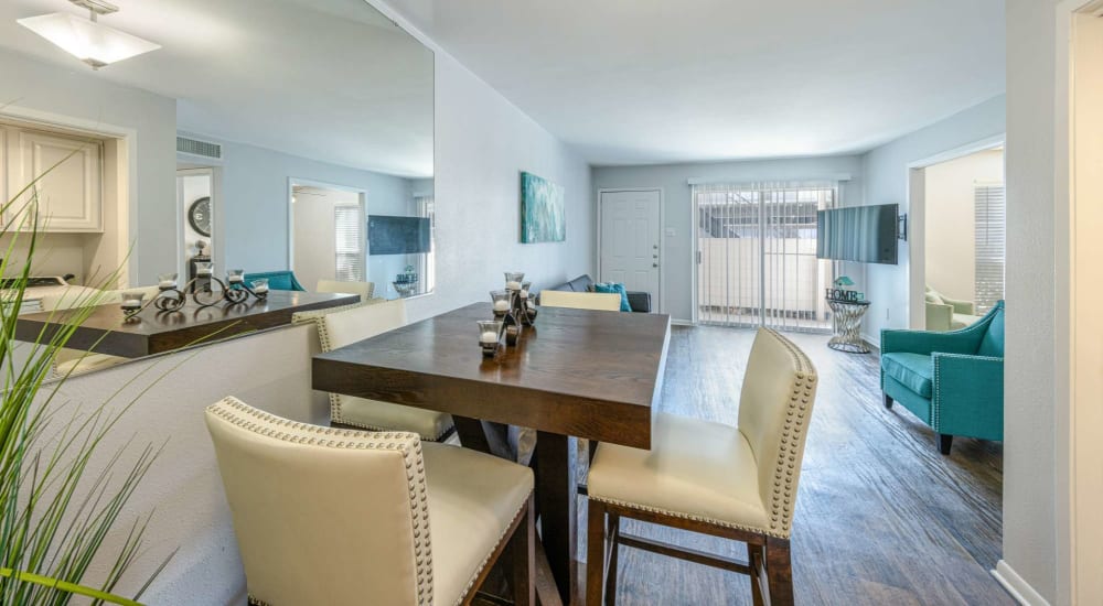 Living space with wood-style flooring at The Landing at Clear Lake in Webster, Texas