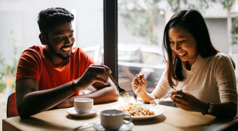 Couple enjoying a meal near The Edge On Main in Lebanon, Tennessee