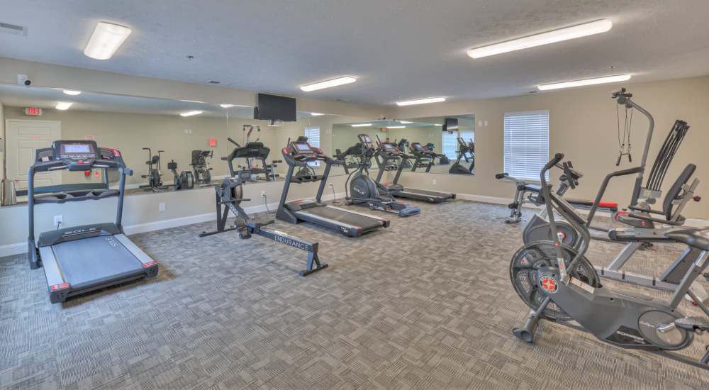Fitness center with cardio equipment at Mill Springs Townhomes in Smyrna, Tennessee