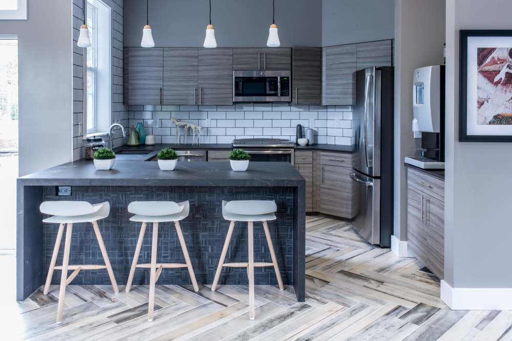 Kitchen with countertop seating at Brookside Village in Auburn, Washington