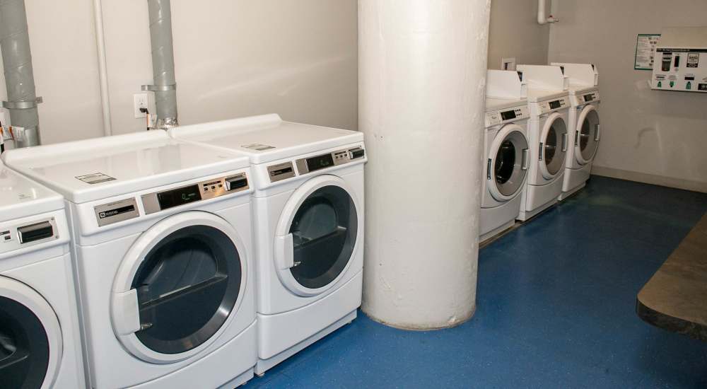 Laundry room at The Lofts At Clifford Brown Walk in Wilmington, Delaware