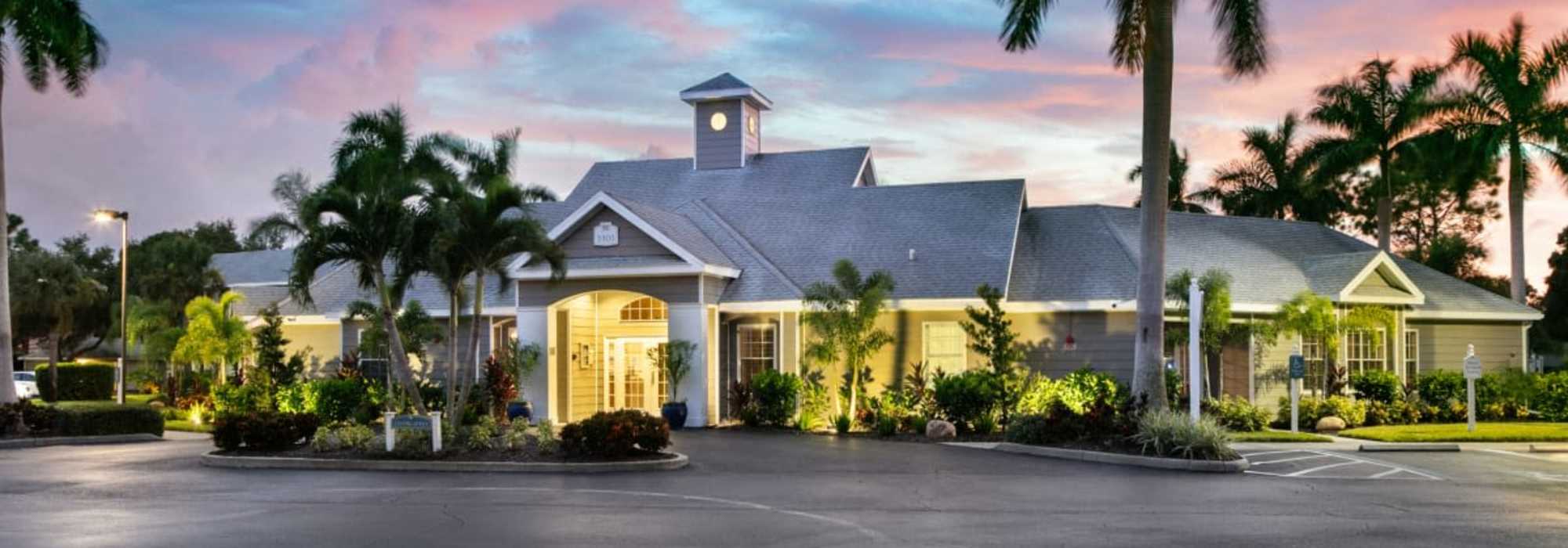 A picturesque view of the apartment building at Woodmere Apartments of Venice in Venice, Florida