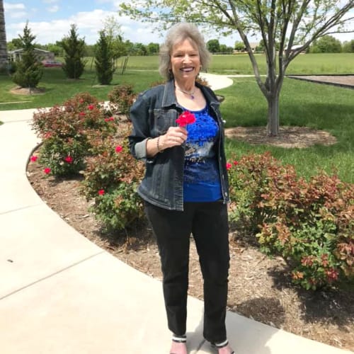 Resident standing outside at Oxford Villa Active Senior Apartments in Wichita, Kansas