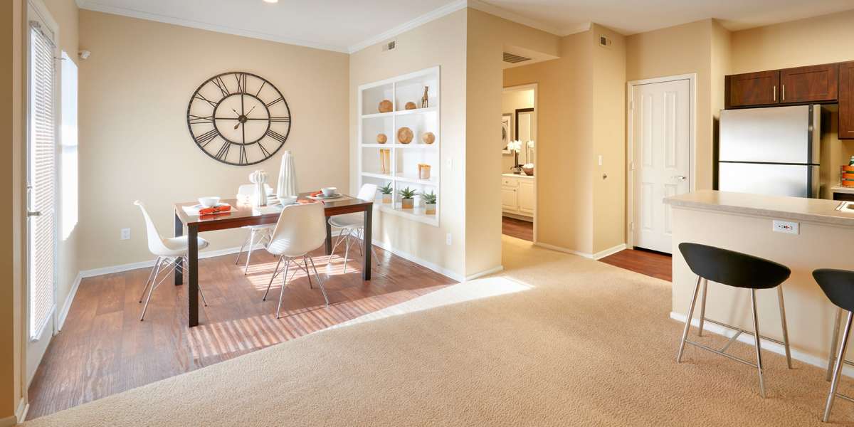 Beautiful living room  and an open kitchen at Legend Oaks Apartments in Aurora, Colorado