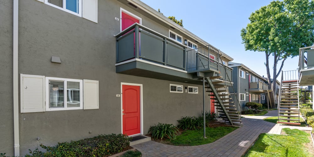 Apartment building exterior at Pinebrook Apartments in Fremont, California