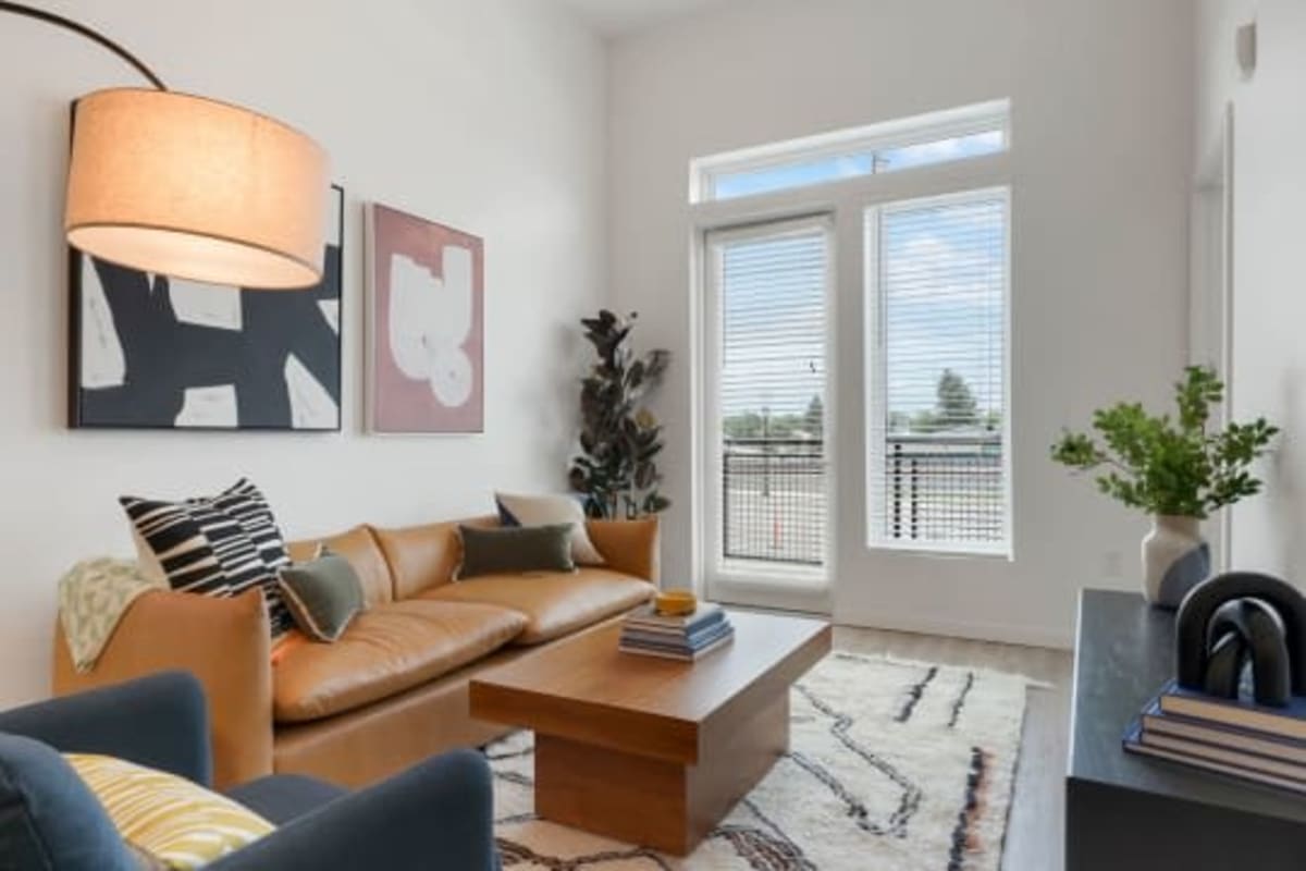 Furnished living room in a model apartment at The Parallel in Wheat Ridge, Colorado