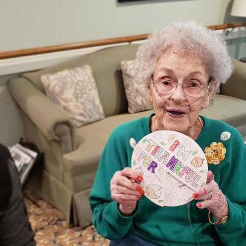 A happy resident at Canoe Brook Assisted Living & Memory Care in Catoosa, Oklahoma