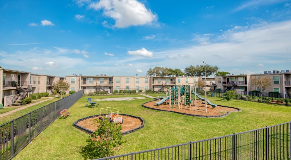 Family playground area at Kingswood Village Apartments in Houston, Texas