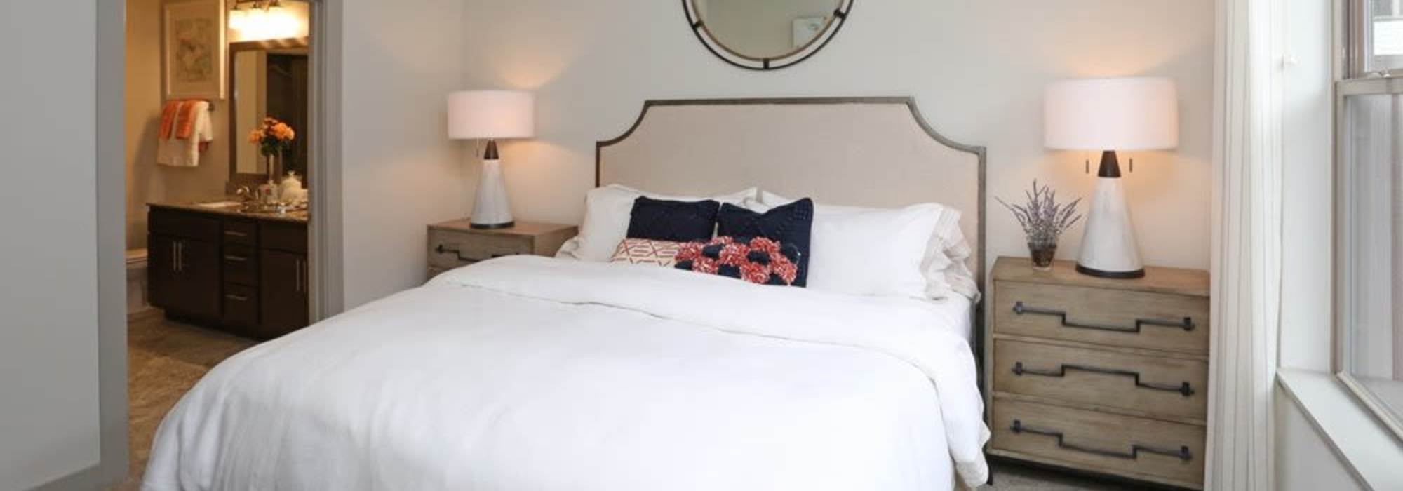 Bedroom with lamp at The Marling in Madison, Wisconsin