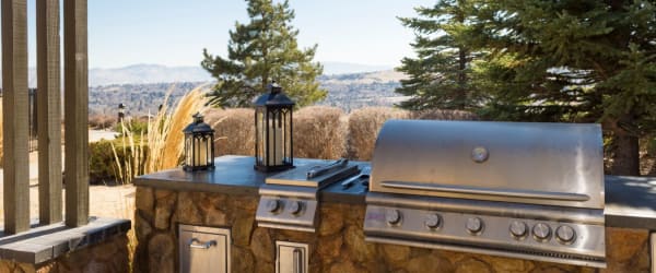 Outdoor grill with view in background at Montebello at Summit Ridge in Reno, Nevada
