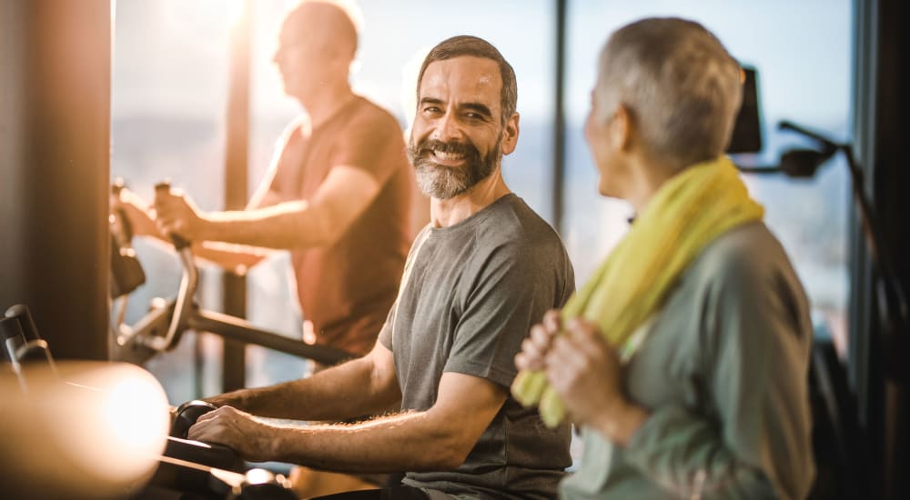 Residents exercising in the fitness room at Fox Plan Apartments in Monroeville, Pennsylvania