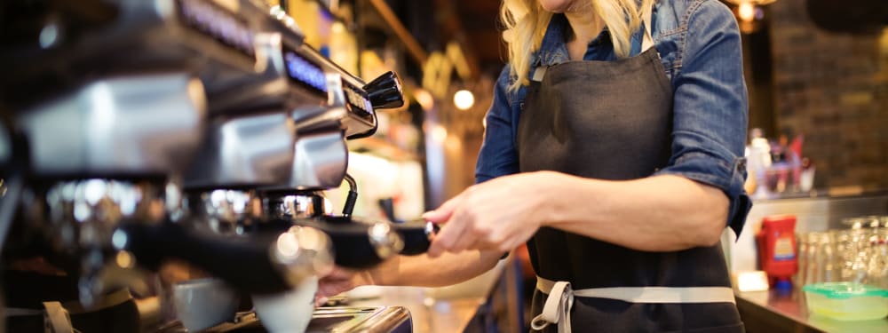 Local barista making coffee near The Highlands at Silverdale in Silverdale, Washington