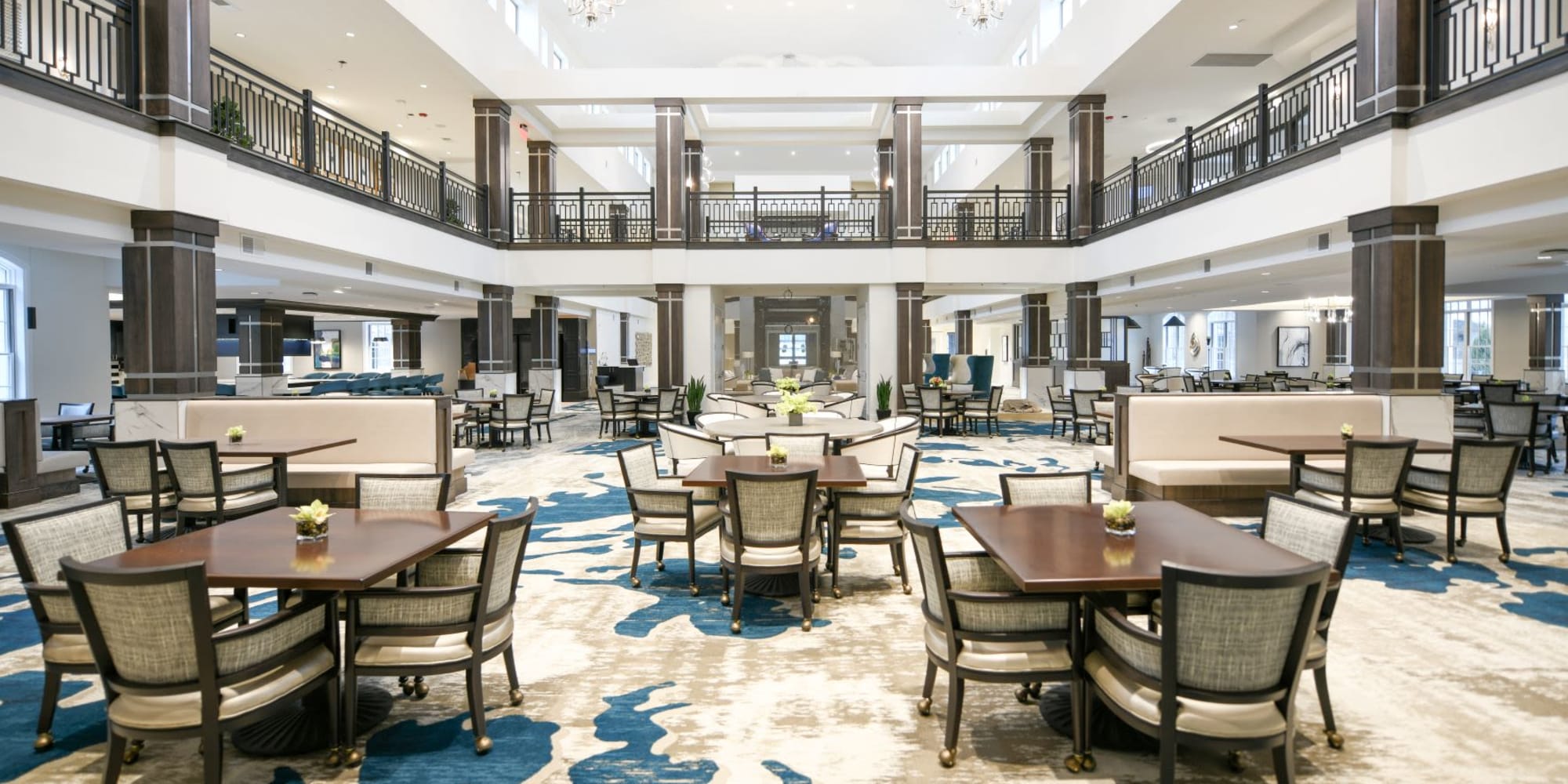 Luxurious dining hall with a view from the 2nd floor at Blossom Ridge in Oakland Charter Township, Michigan