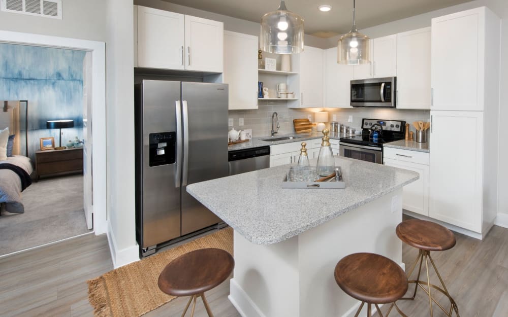 Granite countertops in model home's kitchen at The Elysian in St Johns, Florida