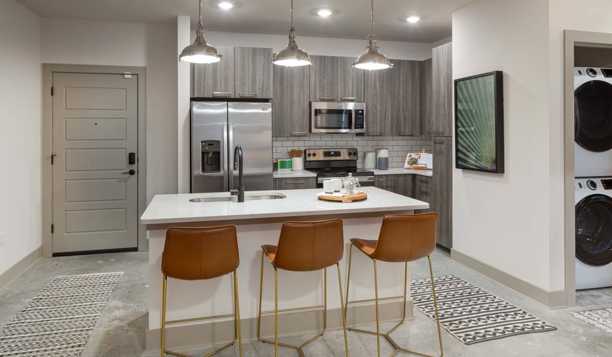 Kitchen with an island at Venable Durham Apartments in Durham, North Carolina