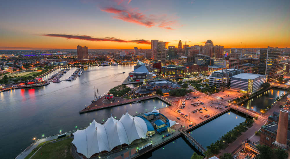 City skyline with sunset and waterfront at The Billie in Baltimore, Maryland 