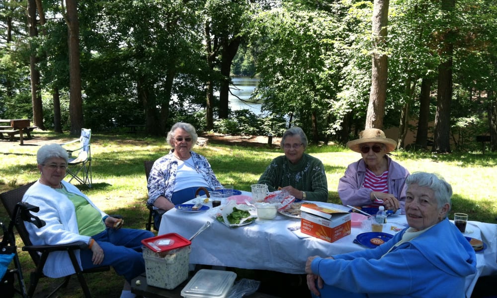 Outdoor patio gathering at Keystone Commons in Ludlow, Massachusetts