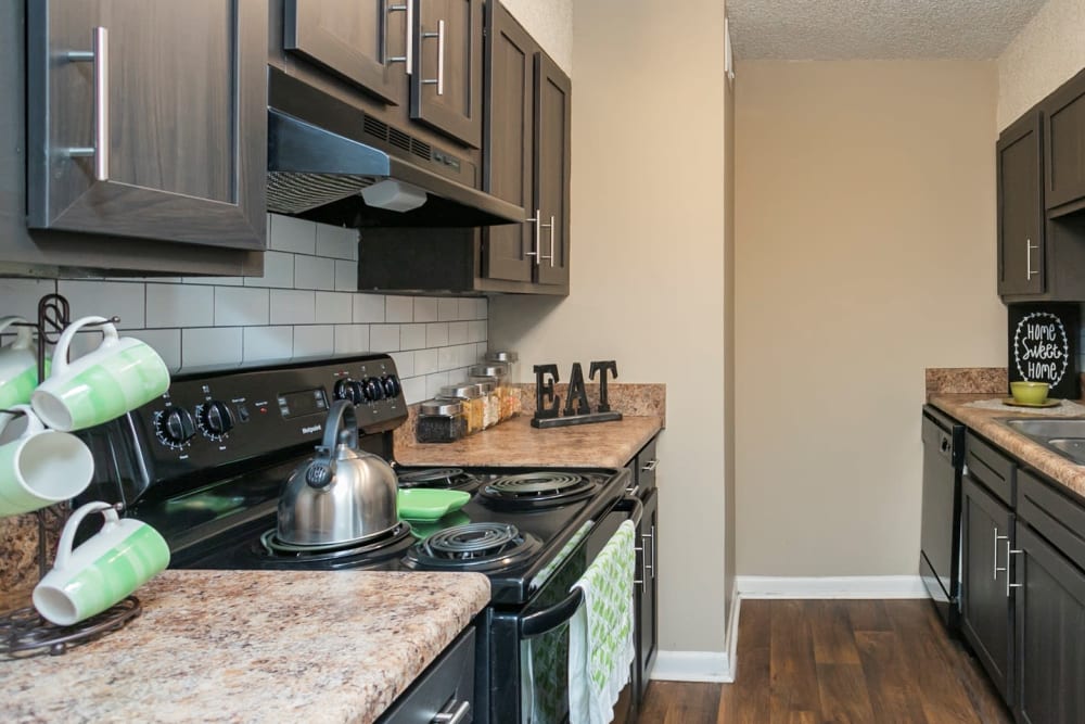 Modern kitchen at The Village at Crestview Apartments in Madison, Tennessee