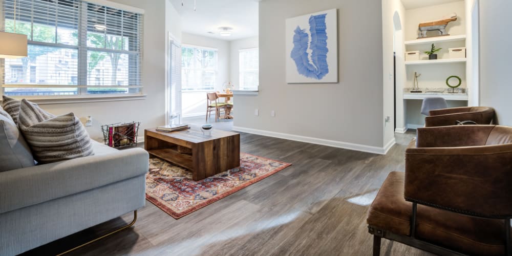 Living room with 2 windows at North Hills at Town Center in Raleigh, North Carolina