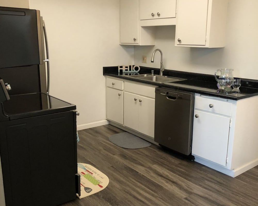 Kitchen with plank flooring at Courtyard in Hayward, California