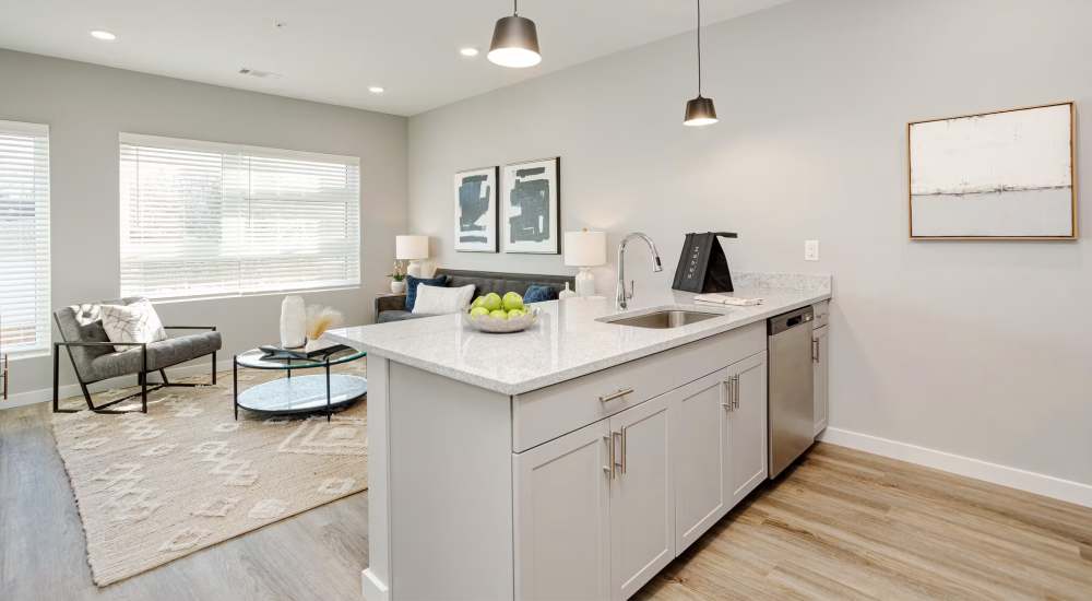 Modern kitchen overlooking living area at 7 at Seven Mile Creek in Nashville, Tennessee