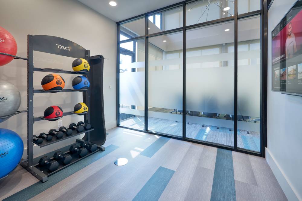 Community fitness center at Strata Apartments in Denver, Colorado