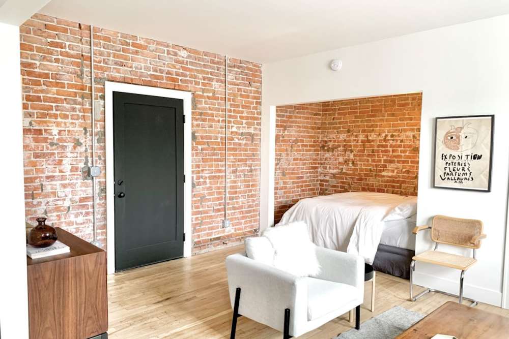 Model living room at Detroit Living in Detroit, 