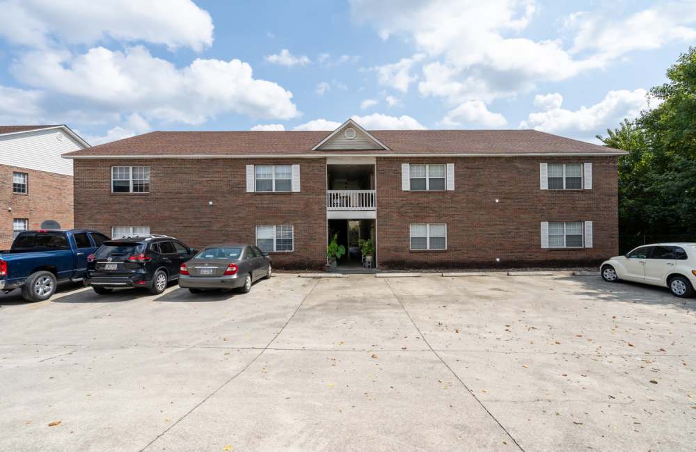 Building with car parking at Spring Hill Apartments in Ringgold. GA