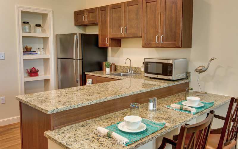 Granite countertops and stainless steel appliances at Barclay House of Stuart in Stuart, Florida