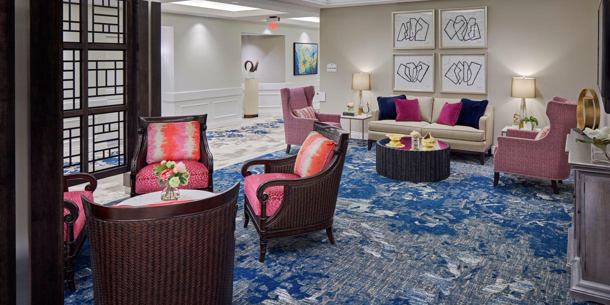 Quite lounge area with an assortment of chairs and couches at Blossom Ridge in Oakland Charter Township, Michigan