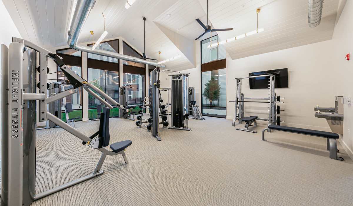 Well-equipped fitness center with various exercise equipment at The View at Belterra in Austin, Texas